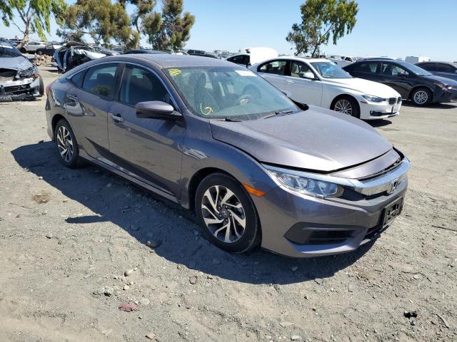 HONDA CIVIC EX 2018 with VIN 2HGFC2F71JH563882 - Photo from auction