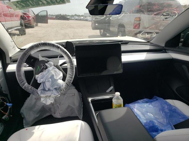 Photo 9 from auction – 2021 TESLA MODEL 3 with VIN 5YJ3E1EA4MF032138