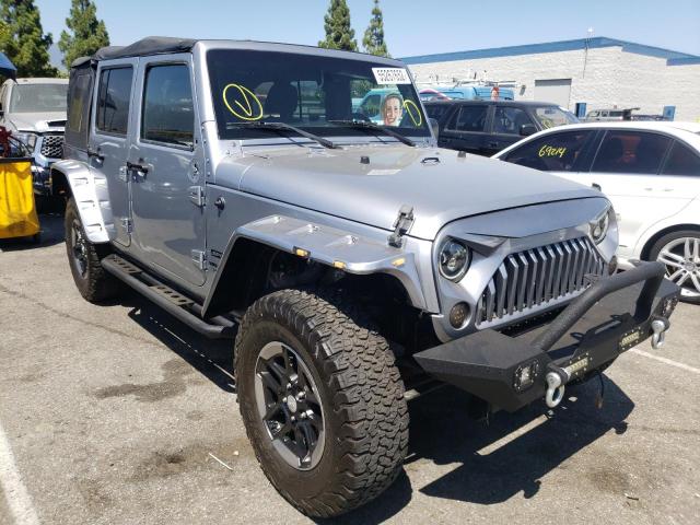 JEEP WRANGLER U 2015 with VIN 1C4BJWDG5FL586556 - Photo from auction