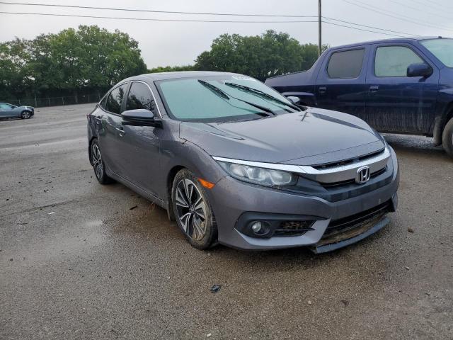 HONDA CIVIC EXL 2017 with VIN 19XFC1F77HE030255 - Photo from auction