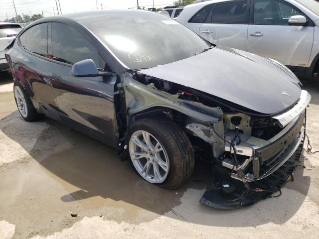 TESLA MODEL Y 2022 with VIN 7SAYGAEE5NF381378 - Photo from auction