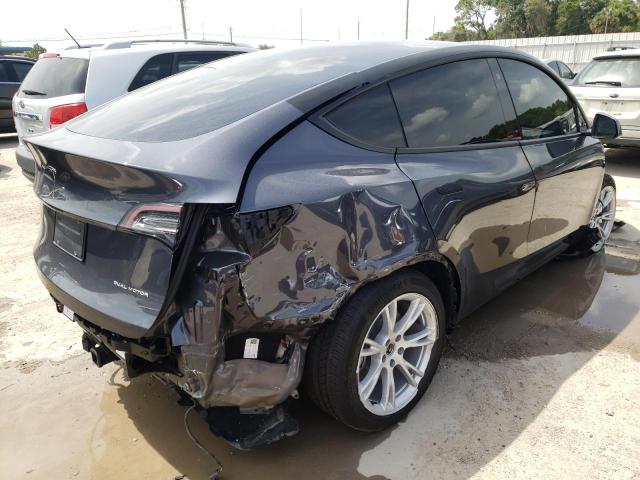 Photo 4 from auction – 2022 TESLA MODEL Y with VIN 7SAYGAEE5NF381378