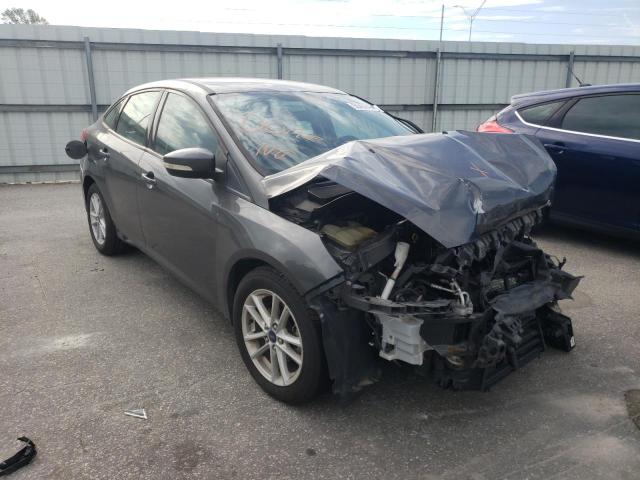 FORD FOCUS SE 2017 with VIN 1FADP3F22HL290930 - Photo from auction