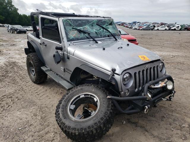 JEEP WRANGLER S 2015 with VIN 1C4AJWAGXFL501162 - Photo from auction