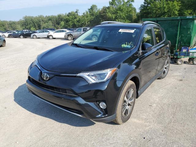 Photo 2 from auction – 2018 TOYOTA RAV4 ADVEN with VIN 2T3RFREV2JW759082