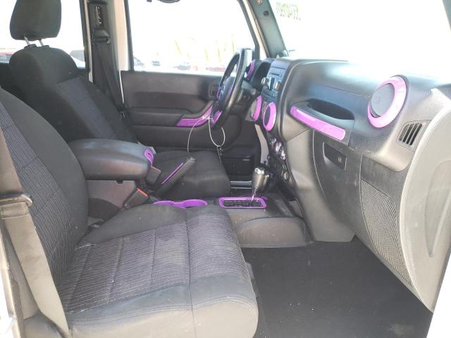 Photo 5 from auction – 2011 JEEP WRANGLER U with VIN 1J4BA5H13BL569680