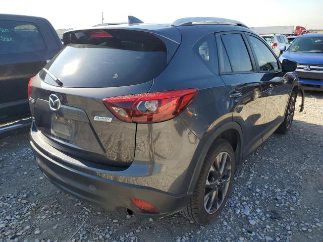 Photo 4 from auction – 2016 MAZDA CX-5 GT with VIN JM3KE2DY9G0718119