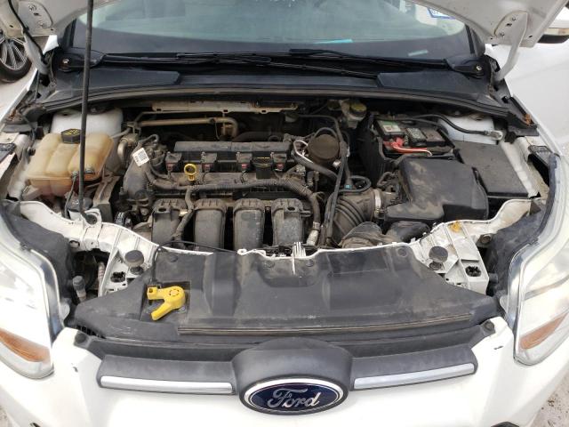 Foto 7 de la subasta – 2014 FORD FOCUS SE con VIN 1FADP3F25EL340750