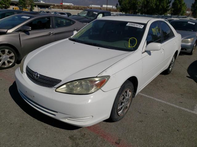 Photo 2 from auction – 2004 TOYOTA CAMRY LE with VIN JTDBE32K140281287