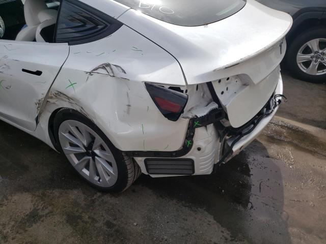Photo 10 from auction – 2021 TESLA MODEL 3 with VIN 5YJ3E1EA4MF032138
