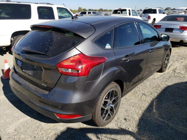 Photo 4 from auction – 2018 FORD FOCUS SEL with VIN 1FADP3M26JL304546
