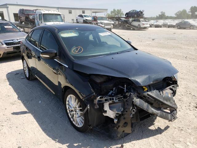 FORD FOCUS TITA 2014 with VIN 1FADP3J2XEL431276 - Photo from auction