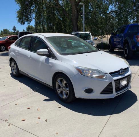 FORD FOCUS SE 2014 with VIN 1FADP3F27EL392185 - Photo from auction
