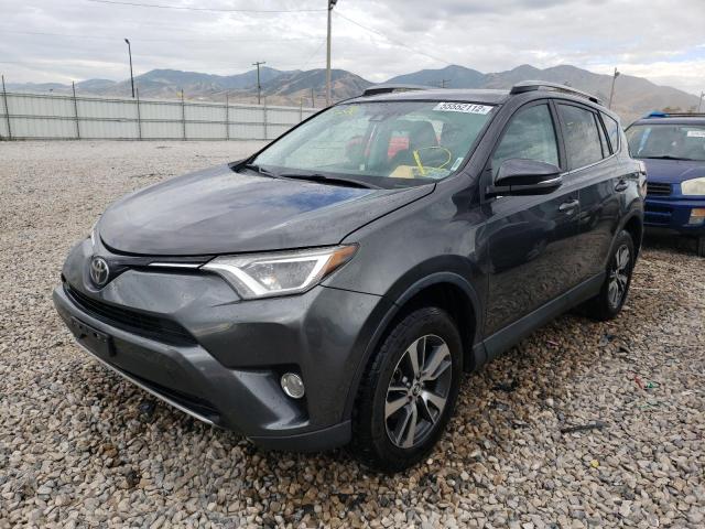 Photo 2 from auction – 2017 TOYOTA RAV4 with VIN 2T3RFREV3HW666999