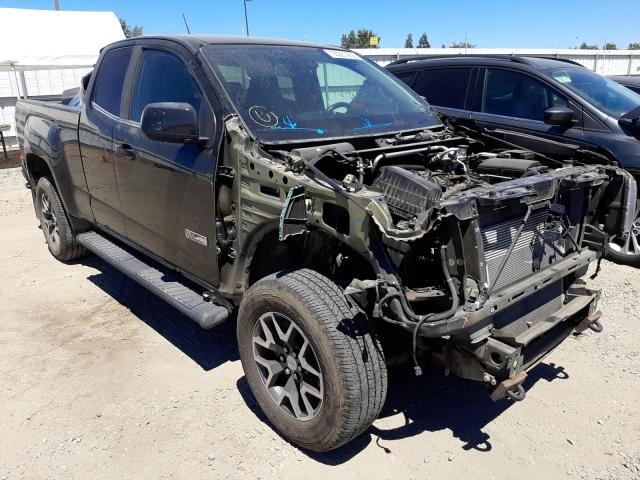 GMC CANYON SLE 2015 with VIN 1GTH6BE32F1141431 - Photo from auction