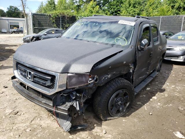 Photo 2 from auction – 2010 HONDA RIDGELINE with VIN 5FPYK1F29AB013867