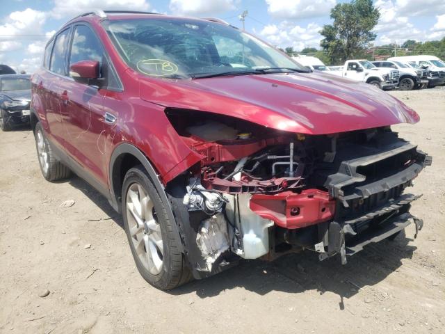 FORD ESCAPE TIT 2014 with VIN 1FMCU0J96EUC75477 - Photo from auction