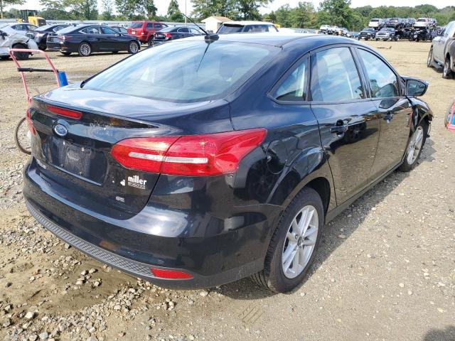 Photo 4 from auction – 2018 FORD FOCUS SE with VIN 1FADP3F26JL237928