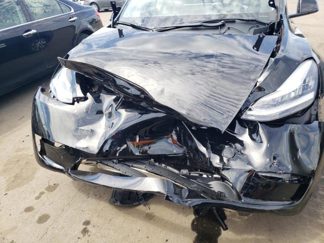 Photo 9 from auction – 2022 TESLA MODEL Y with VIN 7SAYGAEE7NF454668