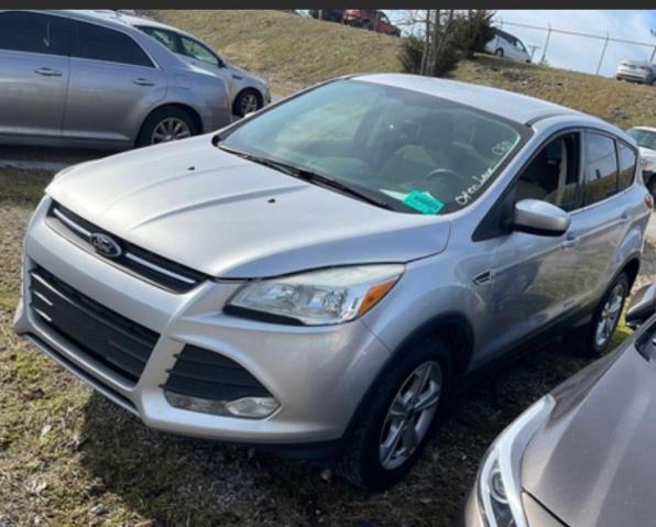 Photo 2 from auction – 2014 FORD ESCAPE SE with VIN 1FMCU0G99EUD58943