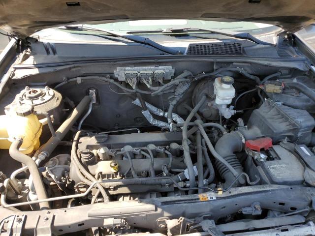 Photo 7 from auction – 2009 MERCURY MARINER with VIN 4M2CU81799KJ03098