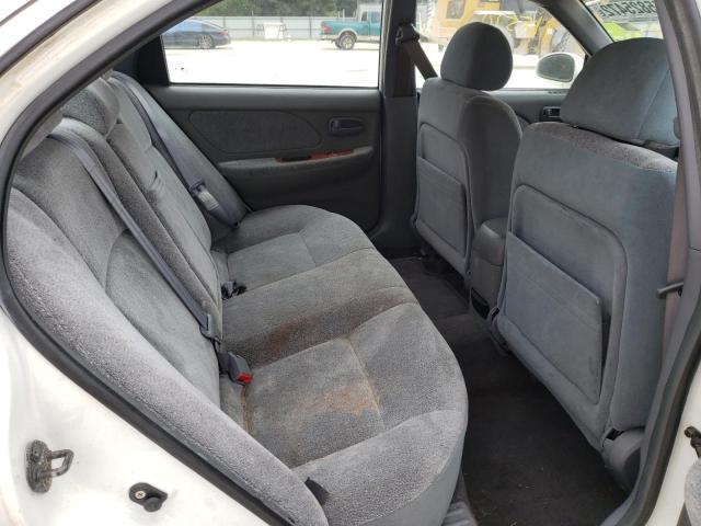 Foto 6 de la subasta – 2002 KIA OPTIMA MAG con VIN KNAGD128X25154228