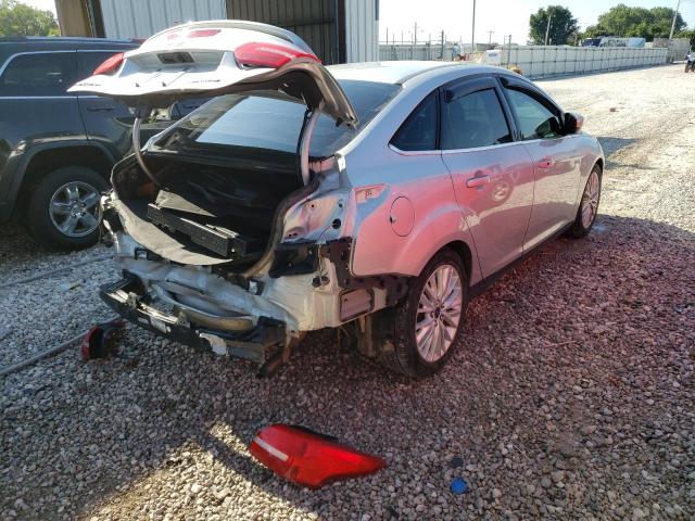 Photo 4 from auction – 2016 FORD FOCUS TITA with VIN 1FADP3J26GL211300