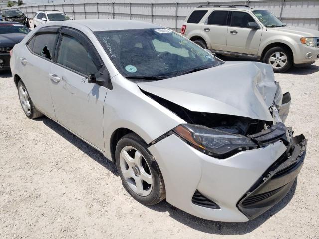 TOYOTA COROLLA L 2019 with VIN 5YFBURHE2KP859875 - Photo from auction