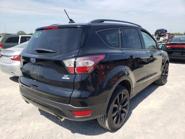 Photo 4 from auction – 2018 FORD ESCAPE SE with VIN 1FMCU0GD5JUA55155