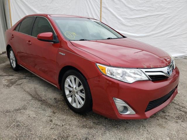TOYOTA CAMRY HYBR 2012 with VIN 4T1BD1FK2CU052864 - Photo from auction