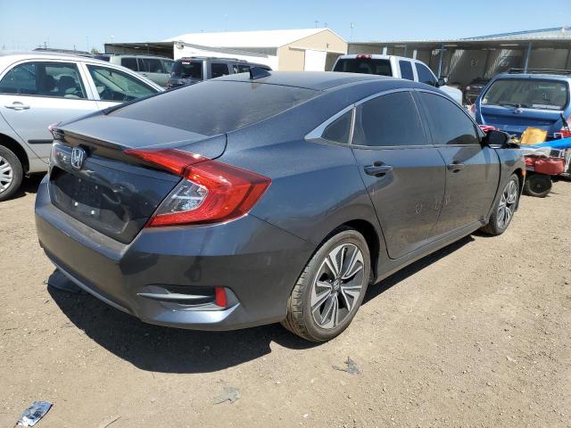 Photo 4 from auction – 2018 HONDA CIVIC EX with VIN JHMFC1F35JX034242