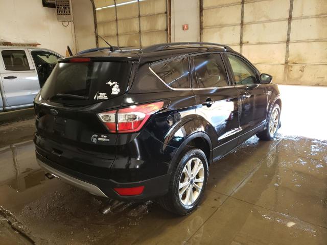 Photo 4 from auction – 2017 FORD ESCAPE SE with VIN 1FMCU9GD2HUB75039