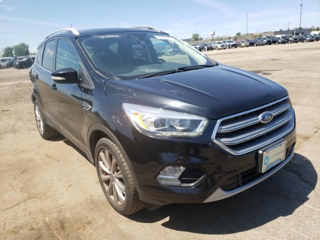 FORD ESCAPE TIT 2017 with VIN 1FMCU9J93HUA44478 - Photo from auction