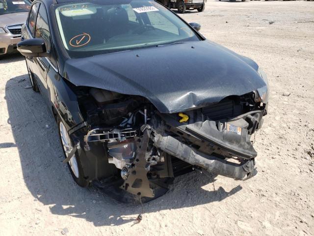 Photo 9 from auction – 2014 FORD FOCUS TITA with VIN 1FADP3J2XEL431276