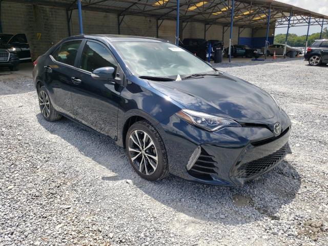 TOYOTA COROLLA L 2017 with VIN 5YFBURHE8HP670558 - Photo from auction