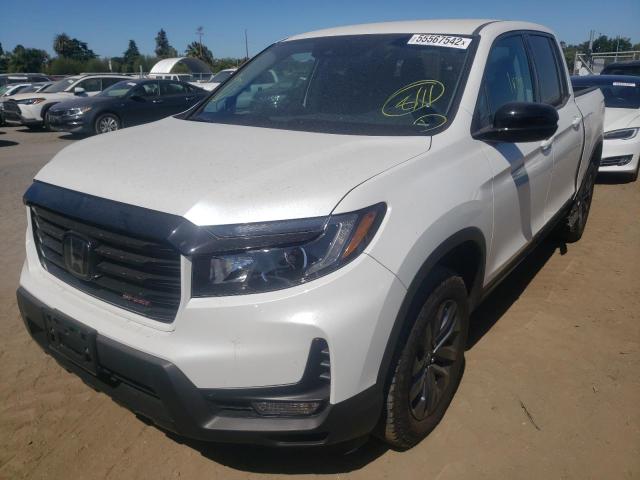 Photo 2 from auction – 2021 HONDA RIDGELINE with VIN 5FPYK3F18MB021904
