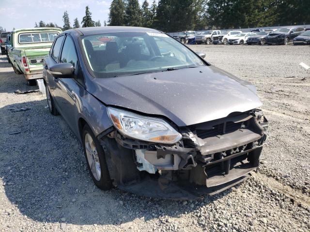 FORD FOCUS SE 2014 with VIN 1FADP3F28EL375542 - Photo from auction