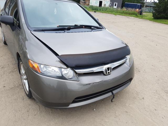 Photo 9 from auction – 2006 HONDA CIVIC DX with VIN 2HGFA15256H035940