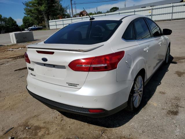 Photo 4 from auction – 2015 FORD FOCUS TITA with VIN 1FADP3J22FL322831