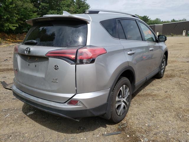 Photo 4 from auction – 2018 TOYOTA RAV4 LE with VIN 2T3BFREV2JW853545