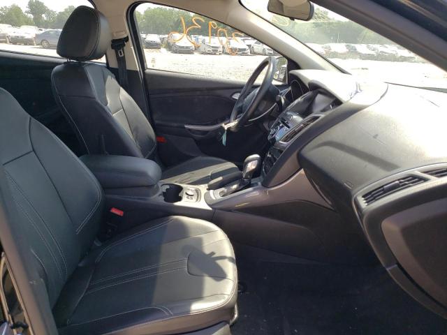 Photo 5 from auction – 2014 FORD FOCUS TITA with VIN 1FADP3J2XEL431276