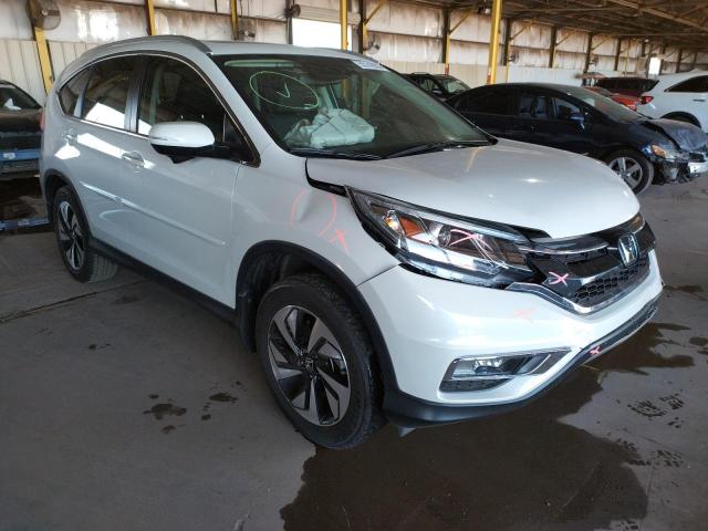 HONDA CR-V TOURI 2016 with VIN 5J6RM3H93GL004398 - Photo from auction