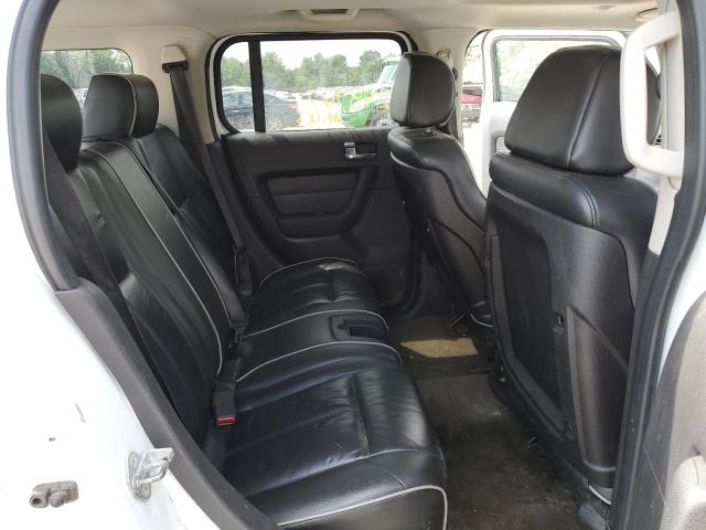 Photo 6 from auction – 2006 HUMMER H3 with VIN 5GTDN136268209185