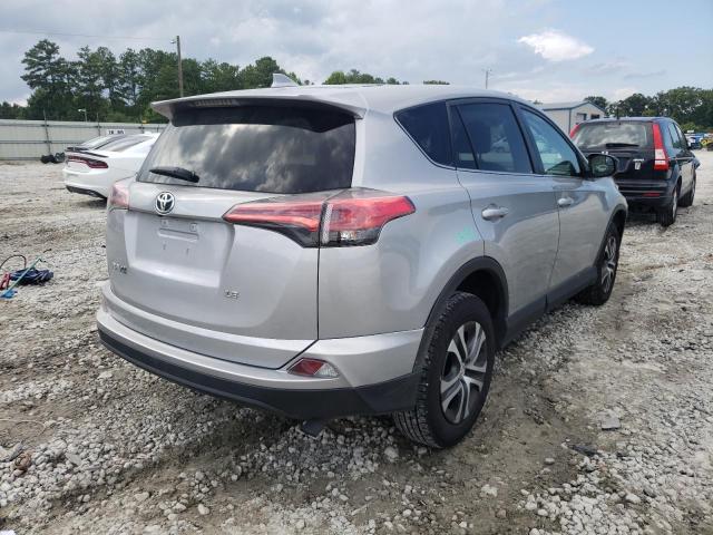 Photo 4 from auction – 2018 TOYOTA RAV4 LE with VIN 2T3ZFREV9JW461581