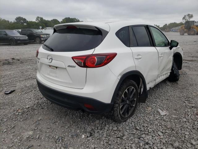 Photo 4 from auction – 2016 MAZDA CX-5 GT with VIN JM3KE2DY0G0781951