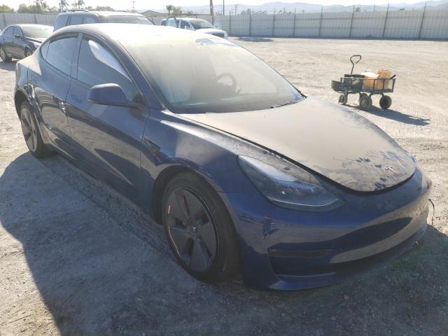 TESLA MODEL 3 2021 with VIN 5YJ3E1EBXMF999815 - Photo from auction