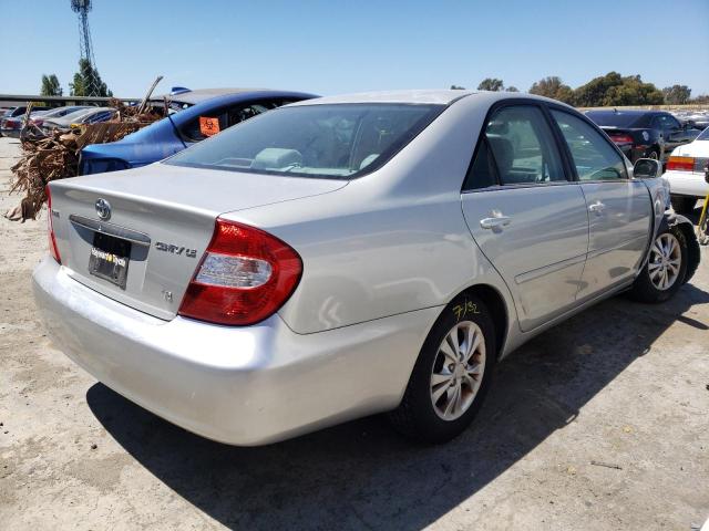Photo 4 from auction – 2004 TOYOTA CAMRY LE with VIN 4T1BF30K44U077538