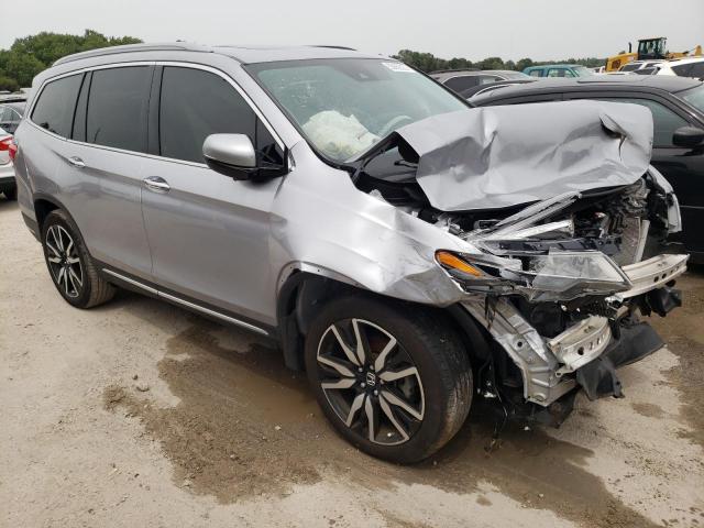 HONDA PILOT TOUR 2019 with VIN 5FNYF5H98KB019546 - Photo from auction