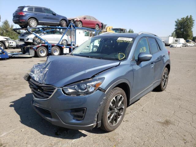 Photo 2 from auction – 2016 MAZDA CX-5 GT with VIN JM3KE4DY3G0678812