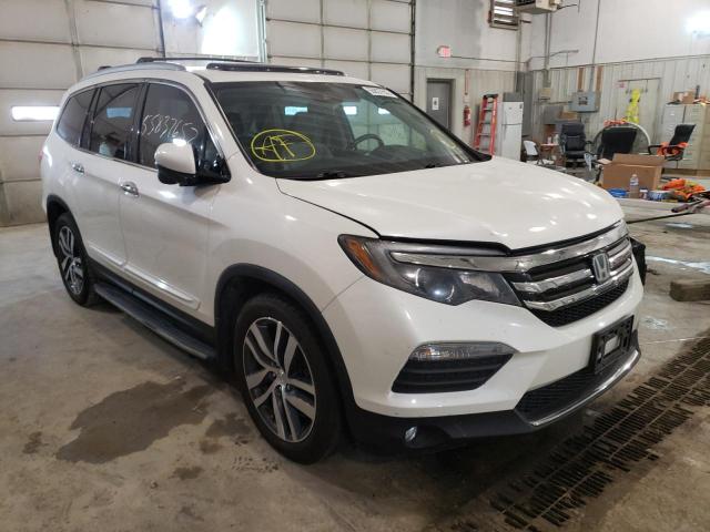 HONDA PILOT TOUR 2016 with VIN 5FNYF6H92GB083711 - Photo from auction
